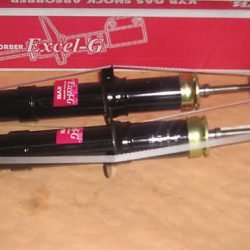 2x tlmiče predná náprava Chrysler Stratus