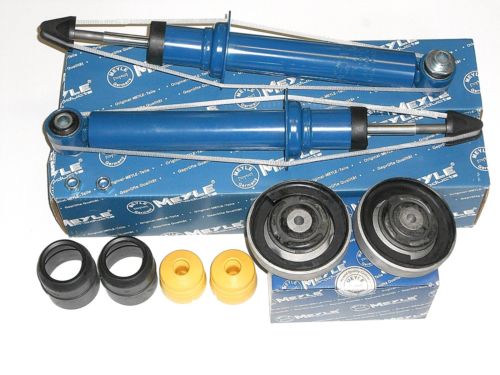 Tlmiče, uloženie tlmiča, dorazy a prachovky zadná náprava BMW 5er E60